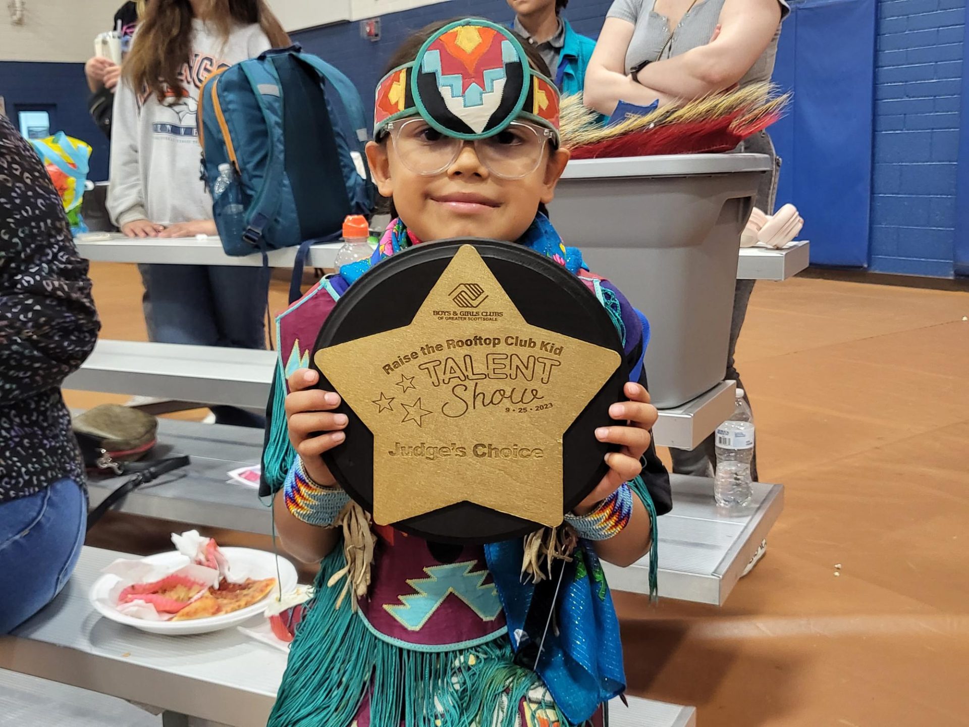 Young Community Member Performs Traditional Fancy Dance at Boys & Girls Club Event Young Community Member Performs Traditional Fancy Dance at Boys & Girls Club Event