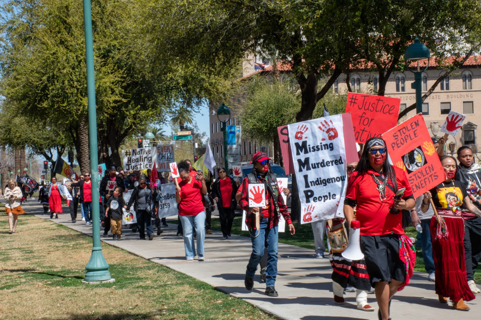 Arizona Capitol Protests: ‘No more stolen people. No more stolen benefits’ Protestors gathered at the state Capitol on March 18.