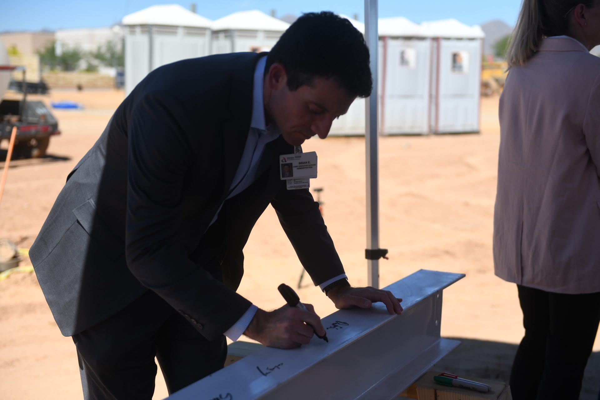 Arizona Sports Medicine Center Holds Beam-Signing on Tribal Land