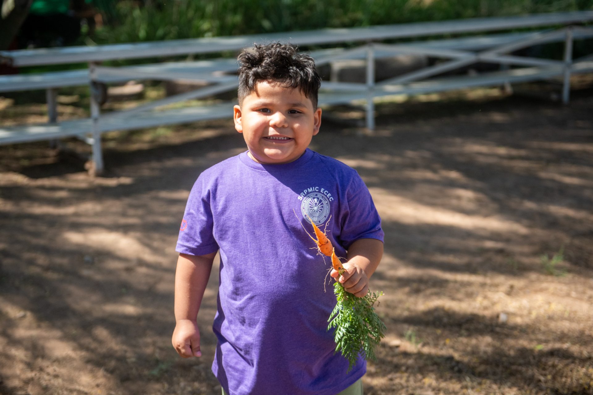ECEC Students Learn Where Their Food Comes From at Community Garden